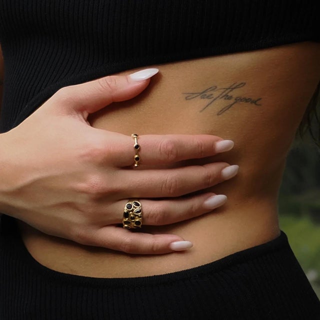 Teardrop Onyx Stone & Gold Adjustable Statement Ring, a bold and elegant piece designed for the modern, stylish woman....