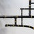 Vintage Chinoiserie Faux Bamboo Pagoda Chandelier Black and Gold Linear Island Pendant Light For Sale In New York - Image 6 of 14