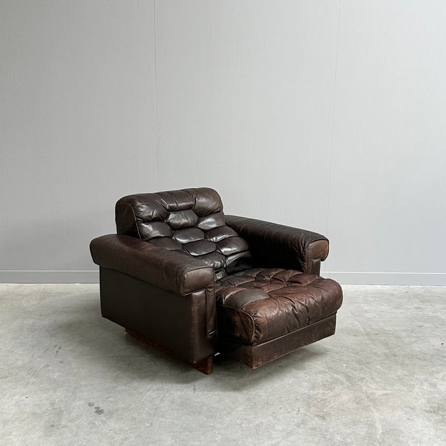 Comfortable leather armchair designed by Robert Haussmann for De Sede. Iconic honeycomb stitching, down filling and...