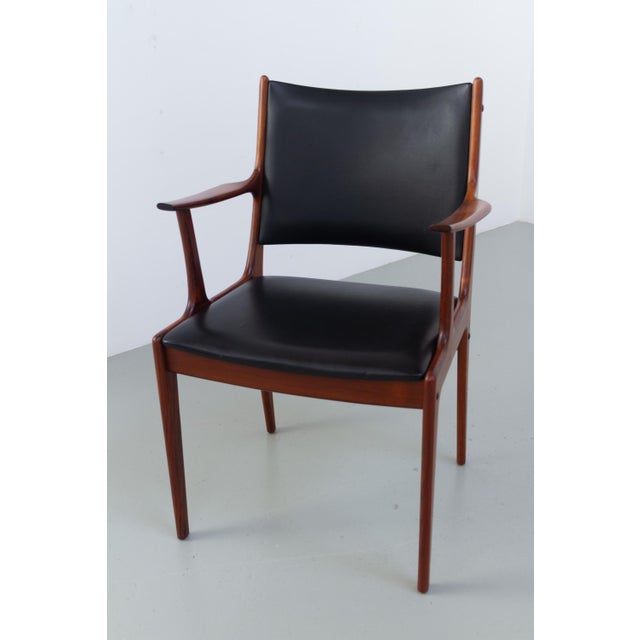 Iconic Danish Santos Rosewood Armchair by Johannes Andersen for Uldum Møbelfabrik, 1960s. Elegant and beautiful...