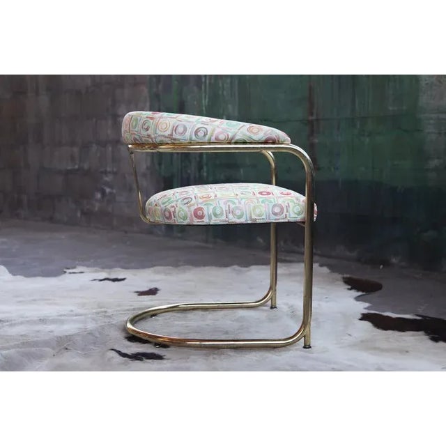 Materials Chrome, bent chrome, upholstered, Brass, Gold, Hollywood Regency Mid Century Modern Arm Chair attributed to...