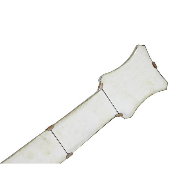 Swedish mid century wall mirror of a life size guitar circa 1950. Cut mirror with beveled edging in the shape of a life...