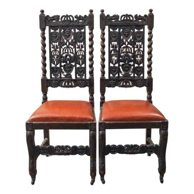 Pair of Antique Jacobean Revival Carved Oak Hall Chairs With Heraldic Crest Backs & Leather Seats For Sale