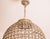 Luxurious French spherical-shaped chandelier of crystal glass. The chandelier mounts one light and 27. It measures 100...