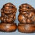 This charming pair of carved boxwood guardian lions brings a warm, organic presence to any interior. Each lion is finely...