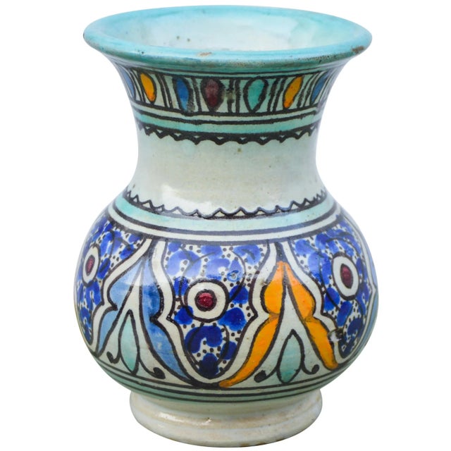 Antique handcrafted Moroccan polychrome ceramic vase featuring an elaborate hand-painted Moorish pattern. Signed and...