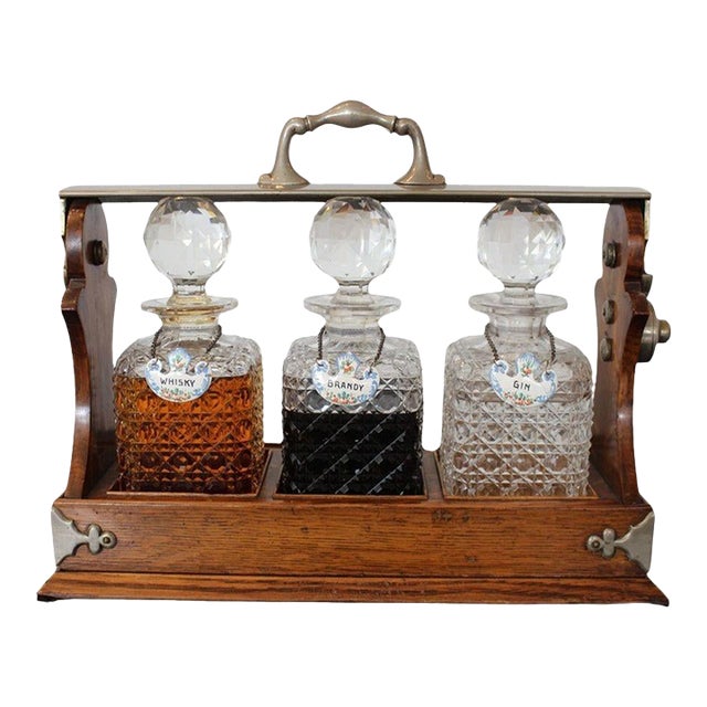 Antique English Oak Tantalus With Three Cut Crystal Decanters, C. Late 1800s For Sale