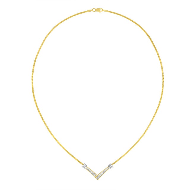 This stunning 14K yellow and white gold pendant necklace features a V shaped pendant inset with two rows of invisible set,...