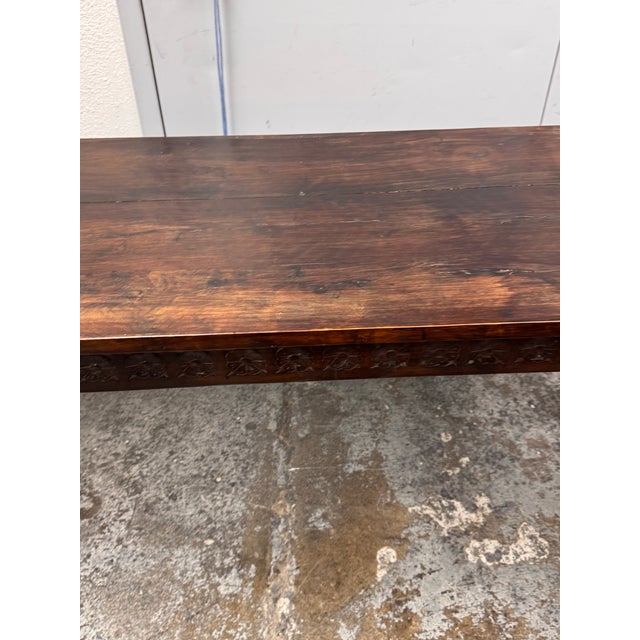 Design Plus Gallery presents a Vintage Carved Wood Console. Crafted in dark stained wood, this long and narrow piece...