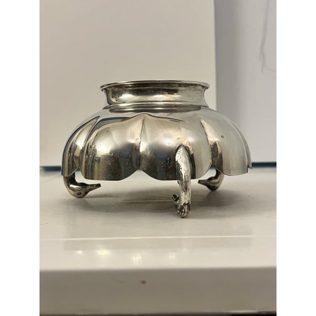 Elevate your table with this charming mid-century silver-plated serving bowl by the acclaimed Greek silversmith Lambidis....