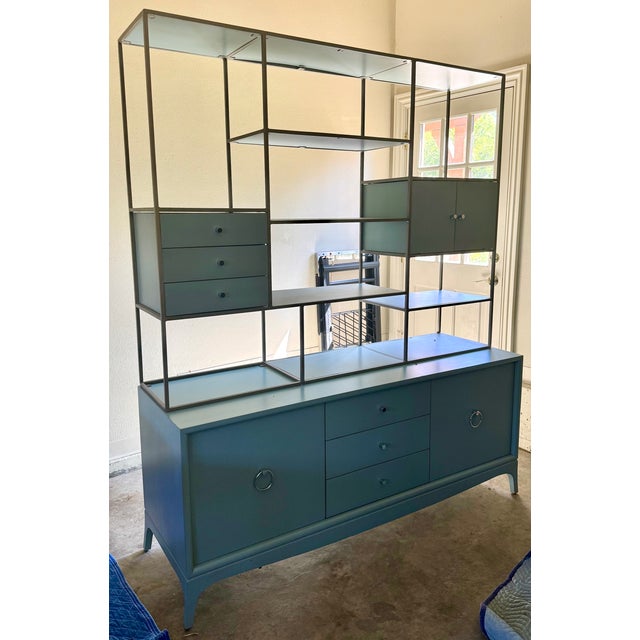 A striking two-piece storage and display cabinet by Redford House, combining the Fiona 3 Drawer Entertainment Console with...