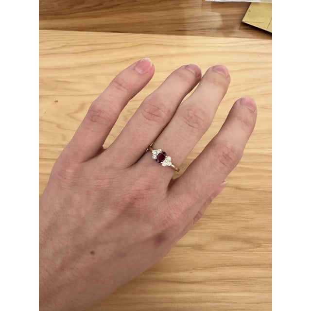 Elevate your look with a minimalist ruby ring. Crafted with a stunning oval natural earth mine ruby surrounded by natural...