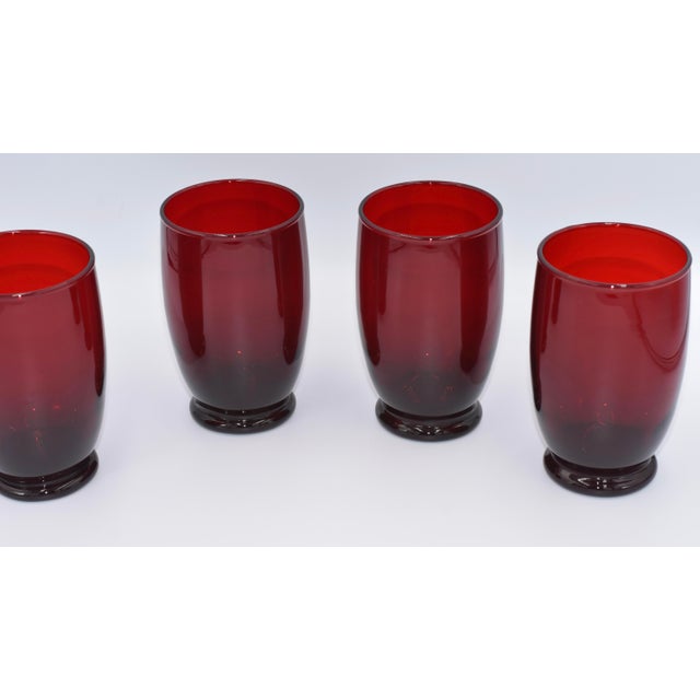Elevate your home entertaining with this exquisite 4-piece Baltic Royal Ruby goblet set, masterfully crafted by ANCHOR...