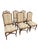 Set of 6 armless wood and upholstered armless French dining chairs. Carved floral details and cabriole legs. Cross x...