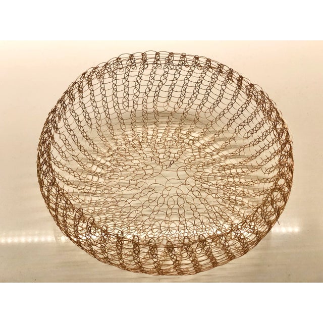 Hand-looped bronze wire, basket-form vessel. Unmarked.