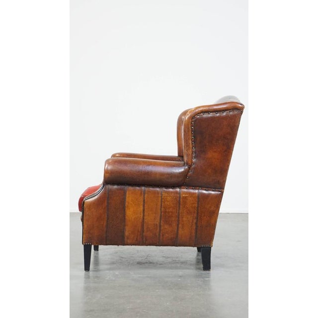 Vintage Leather Wing Chair with Red Corduroy Seat Cushion For Sale - Image 5 of 14