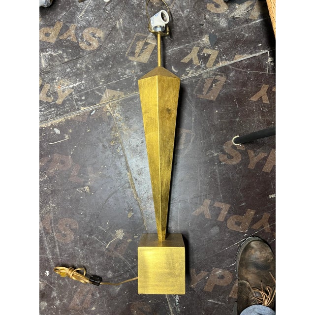Gorgeous postmodern style gold geometric table lamp. Substantial and striking style, with minimalist look 6ʺW × 6ʺD × 24ʺL...