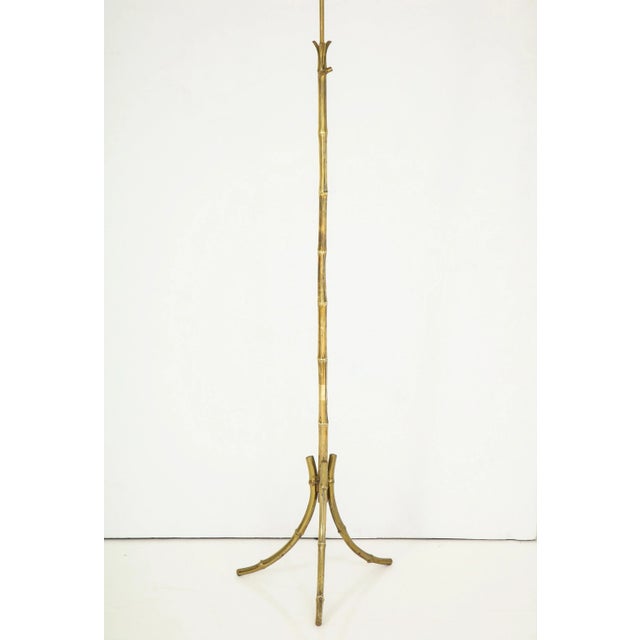 Classic solid bronze floor lamp by Maison Baguès Adjustable height pole Good vintage condition European socket and wiring.