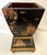Timeless vintage cache pot from the late 20th century. It is made of wood with applied chinoiserie designs in a gold color...