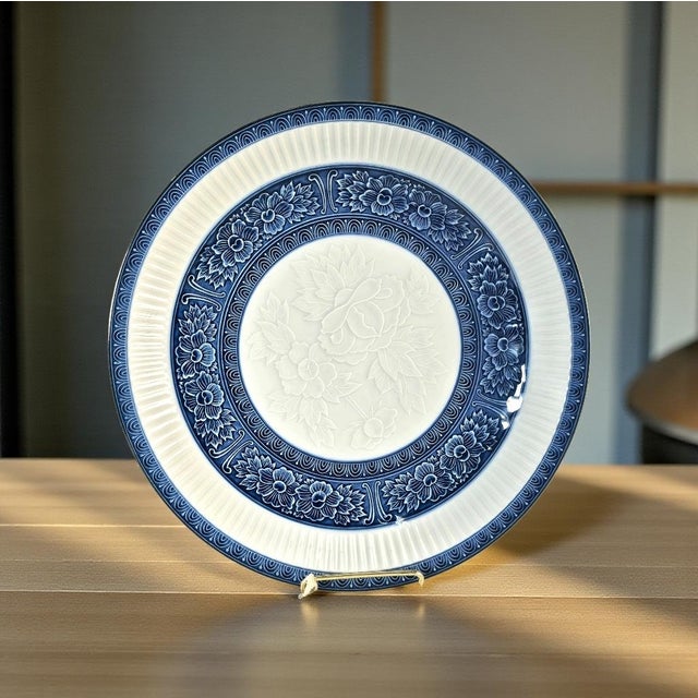 This refined Japanese porcelain charger originates from Arita, the historic center of Japan’s blue-and-white ceramic...
