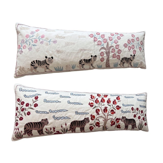 This beautiful 18'' x 54'' hand-embroidered Suzani pillow cover set was made from authentic Uzbek cotton fabric. The...