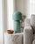 Illuminate your space with the Umbra accent table lamp, a beacon of minimalist modern style. Standing at a sleek 10 inches...