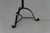 Danish Art Deco Tripod Floor Lamp in Wrought Iron, 1940s. A sculptural handcrafted floor lamp in black painted wrought...