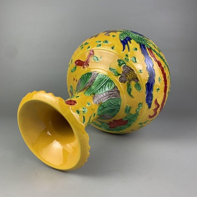 This magnificent vase features the classic Tianqiuping (Globular / Heavenly Sphere) form, characterized by a tall, flared...