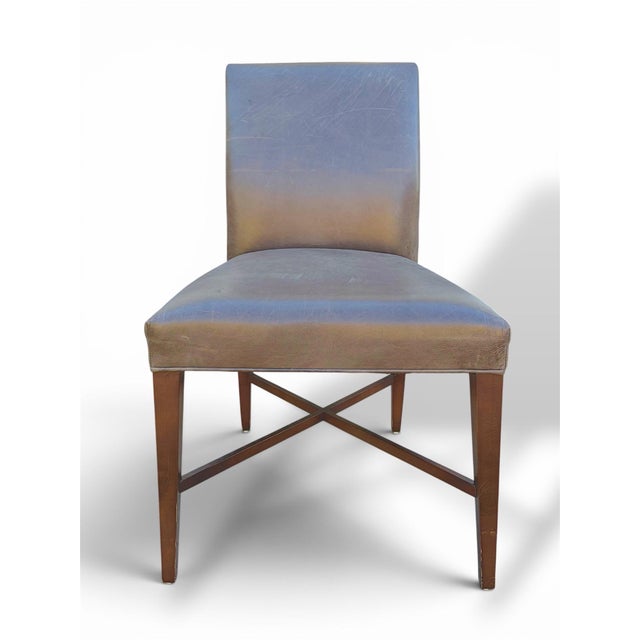 Baker Furniture Brown Leather Dining Chair Set of 7. Supported by a rich mahogany x cross base. A set of seven dining...
