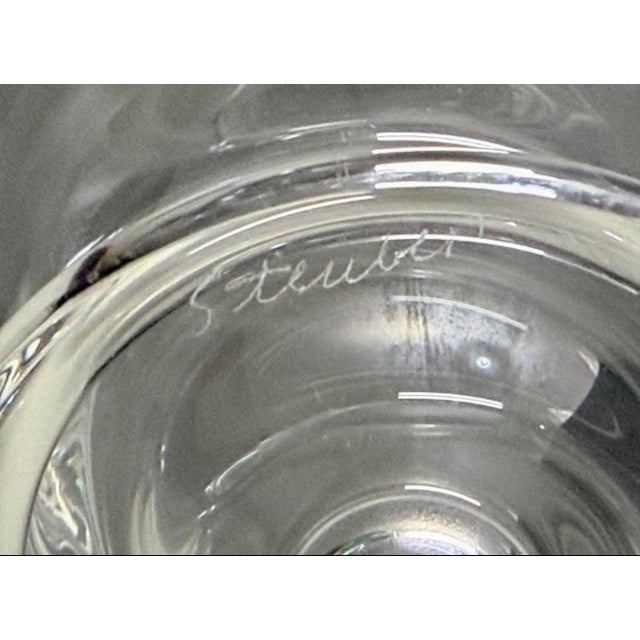 Vintage Steuben crystal "Palace" vase is designed by Donald Pollard in 1977. This clear crystal vase has a rounded body,...