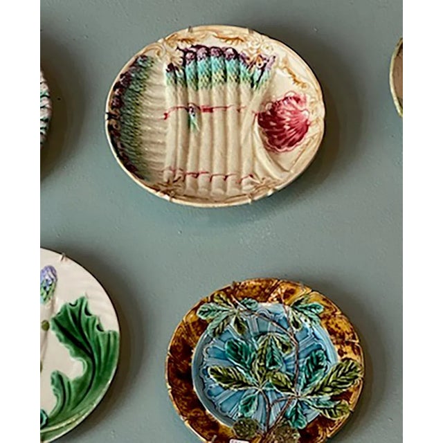 A delightfully colorful asparagus plate. From France, circa 1880.