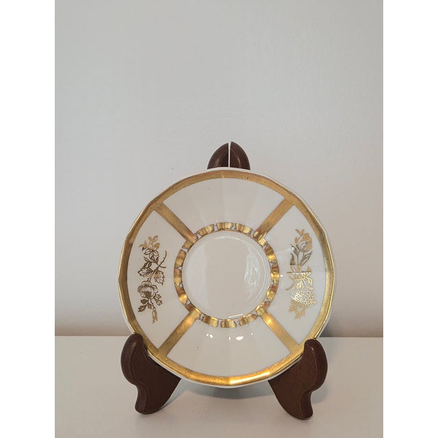 Elegant antique Limoges fine porcelain demitasse saucer featuring a sophisticated Art Deco design dating to the early 20th...