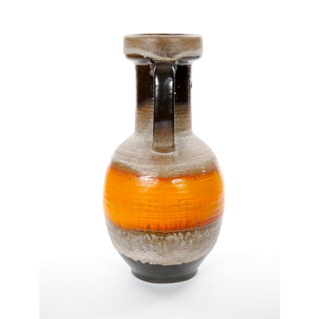 A Very Large & striking mid-century West German drip lava glazed porcelain vase, beautifully showcasing the bold colors...