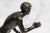 This handsome circa 1890 Grand Tour bronze is a miniature reduction of the celebrated Herculaneum Runner, one of the most...