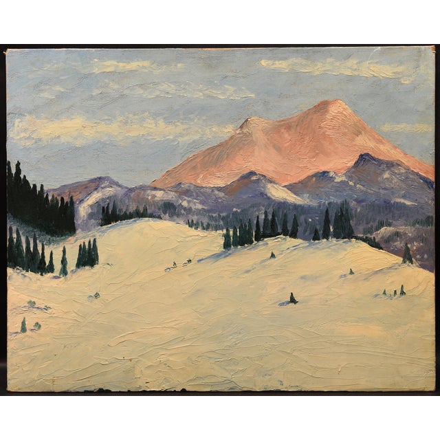 This serene winter landscape captures a breathtaking scene of a snow-covered mountain range. The foreground is dominated...