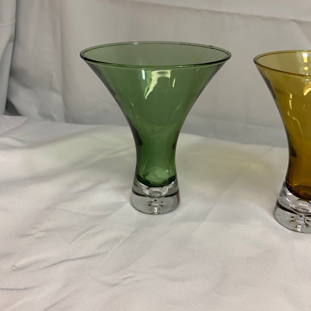 Offered here is a set of 1960s Swedish modern martini cocktail glasses designed by the renowned glass artist Bo Borgström...