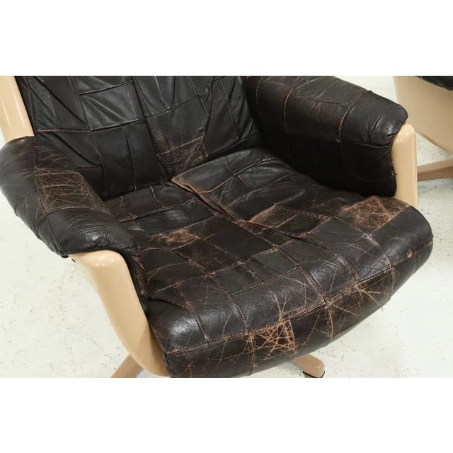 Swedish modern Galaxy armchair by Alf Svensson for Dux designed in 1968. The chair has the original leather upholstery and...