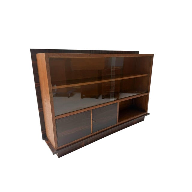 Magnificent and rare Art Deco Modernist bookcase or display cabinet. Striking Dutch design from the 1930s. Solid oak and...