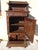 Small storage cabinet, finely hand-carved French. Originating from Brittany, depicting a scene of daily life in bas-...
