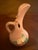The Roseville Mock Orange Pink 1950 Vintage Mid Century Modern Pottery Ewer 916-6 is a unique and stylish piece of...