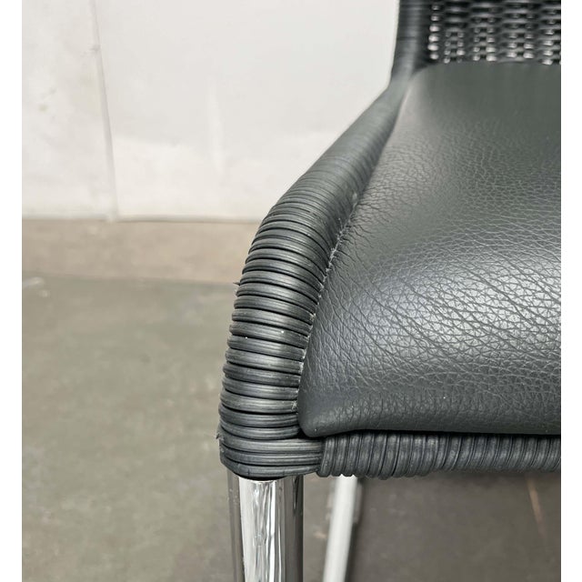 Two classic Tecta cantilever chairs in a rare color with matching leather cushions. Classic tubular steel cantilever...