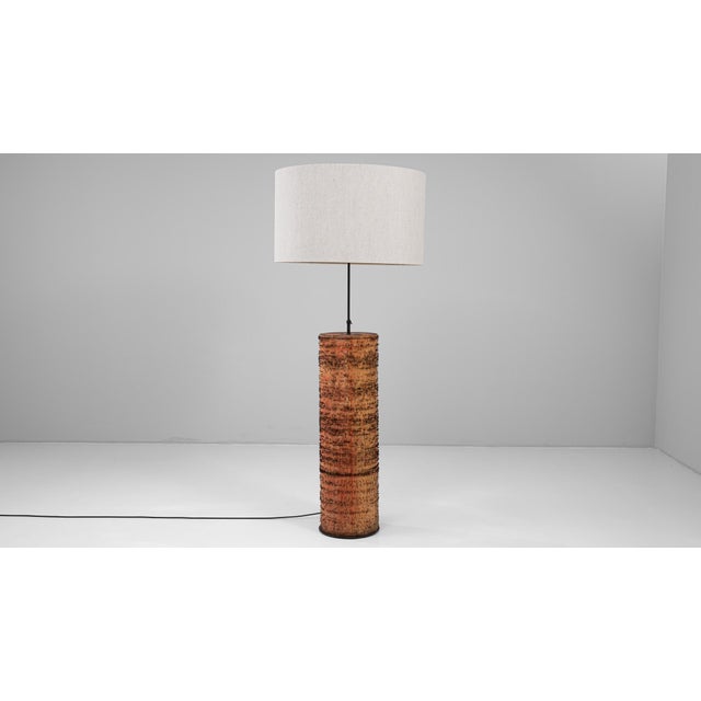 This 1900s French roller organ lamp transforms a historic mechanical artifact into a striking piece of functional art. The...