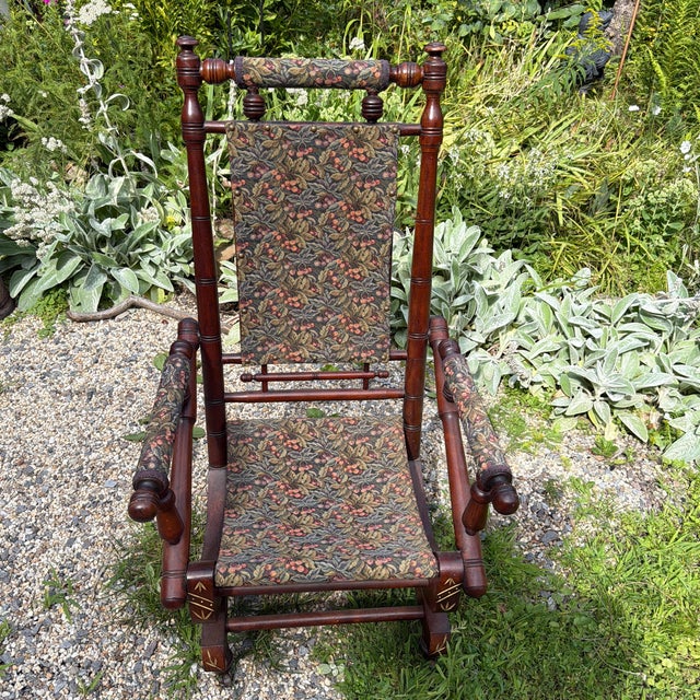 Antique Eastlake rocker. Lovingly restored in 1997. Springs work beautifully- no noise.