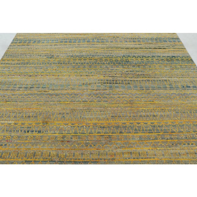 This magnificent 8x10 rug from Rug & Kilim’s Modern Collection rug is a kinetic, textural work of art, hand-knotted in...