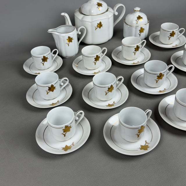 Refined and harmonious coffee service for 12 in fine white porcelain with gold leaf decorations, Regent Alba Iulia...