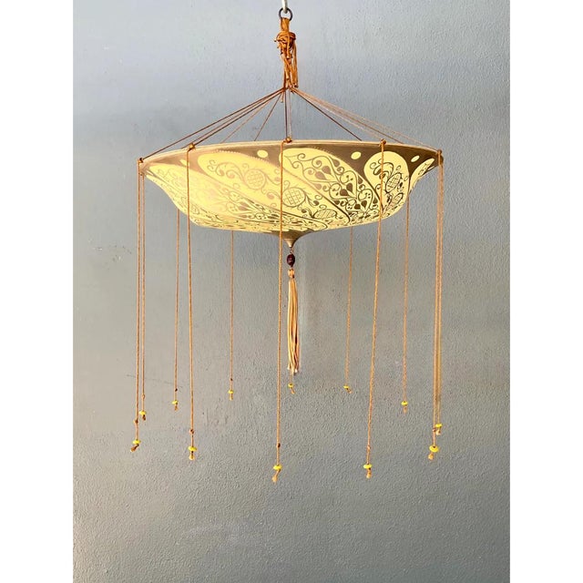 Exemplifying the legendary artistry of the Fortuny brand, this vintage Italian chandelier features a dramatic suspended...