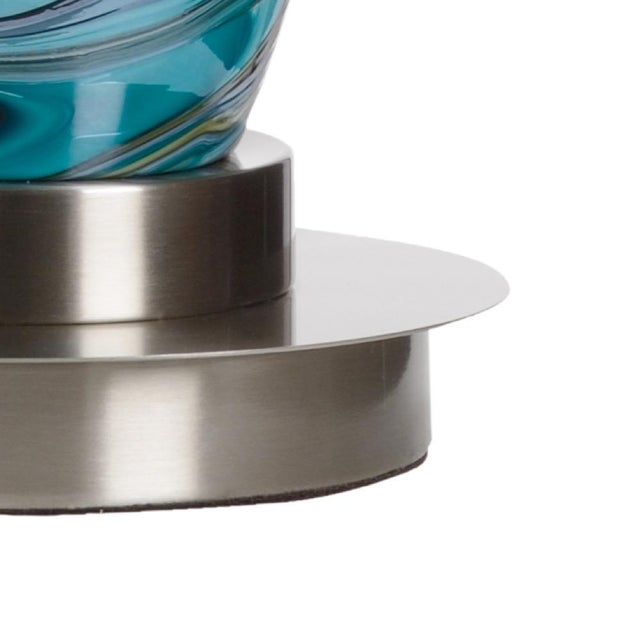 Multi shades of aqua, blue and green art glass with brushed nickel mounting. Due to the hand crafted nature of this...