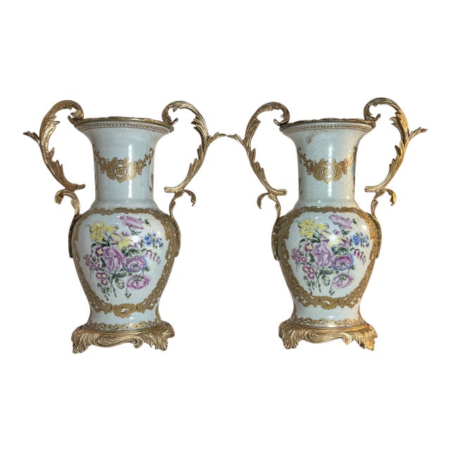 Vintage Ormolu Rococo Ceramic Urns With Floral Motif- A Pair For Sale