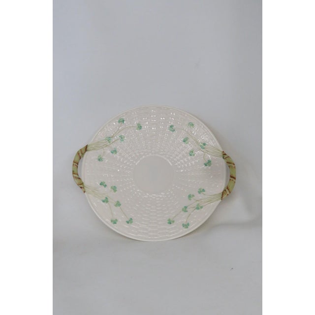 This gorgeous shamrock cake plate is made out of porcelain. This lovely collectible / decorative shamrock cake plate was...