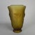 Pressed glass vase from Bohemia, made of matte amber glass and featuring a relief decoration of four different flowers....